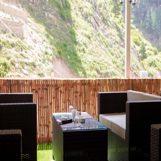 Outdoor lounge seating with mountain backdrop